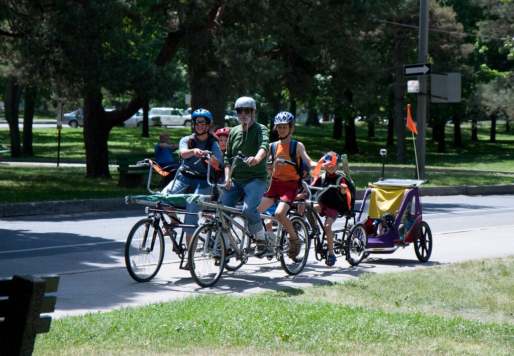 May contain: person, human, wheel, machine, vehicle, bicycle, transportation, and bike