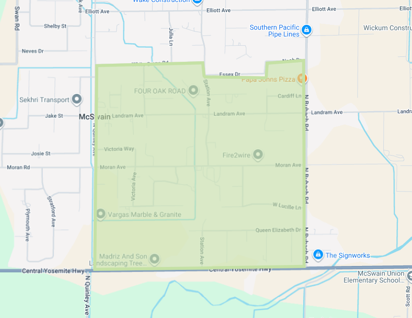 The image shows a map section highlighting streets and businesses in a neighborhood, including Four Oak Road and Papa John’s Pizza.