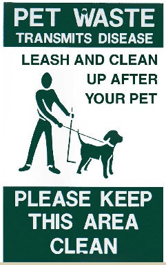 Sign urging pet waste management: "Leash and clean up after your pet. Please keep this area clean."