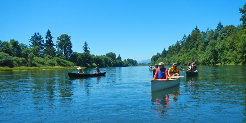 May contain: boat, canoe, canoeing, leisure activities, person, rowboat, sport, transportation, vehicle, water, water sports, nature, outdoors, and scenery