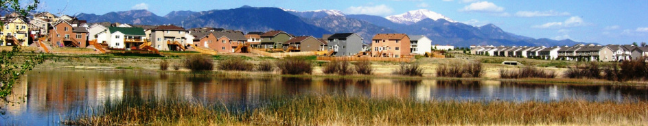 Photo of Hale Reservoir, surrounding Cross Creek community and Pikes Peak in the distance