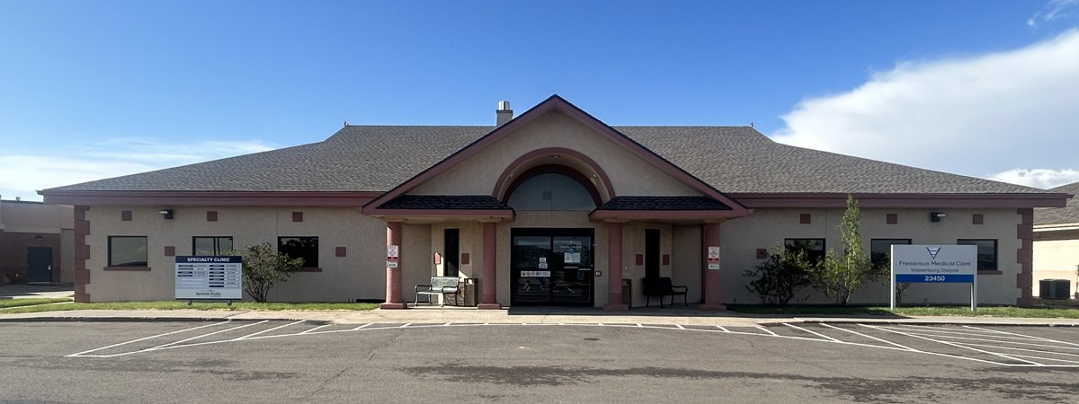 A one-story building labeled "Firestarter Medical Center" with a parking area and signs.