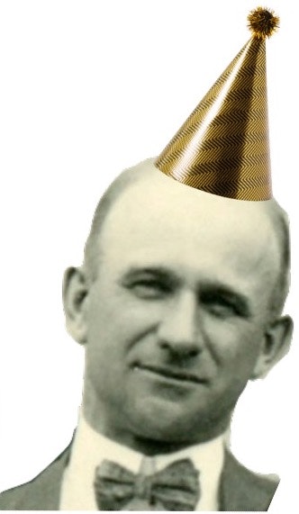 A vintage photo of a man wearing a party hat.