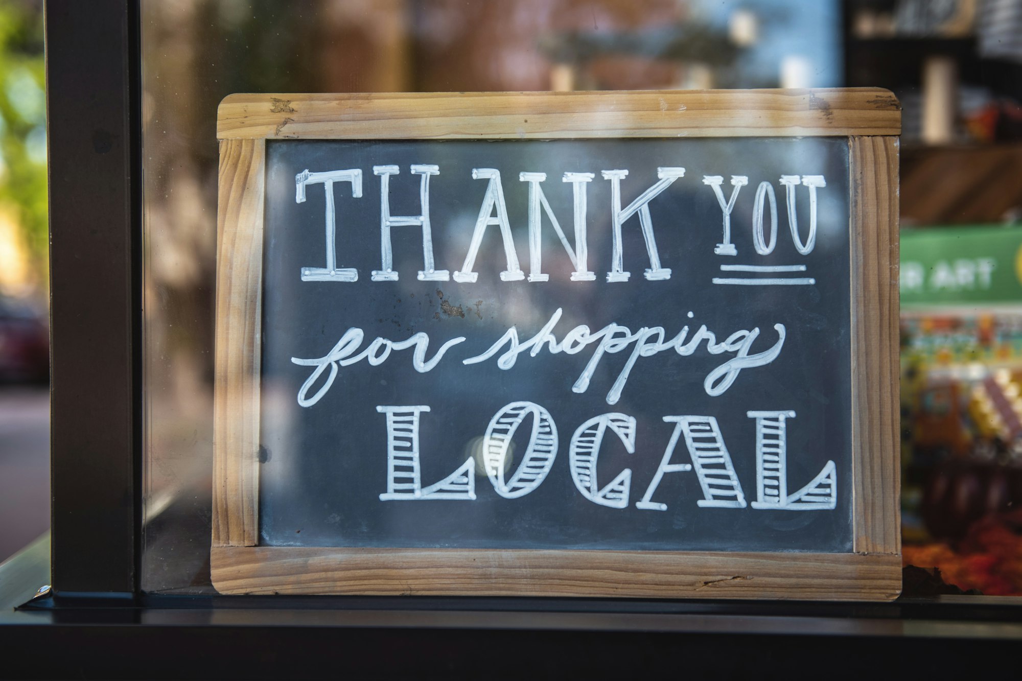 May contain: blackboard that says Thank You for Shopping Local