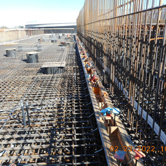 Construction site with reinforcing steel bars for concrete.