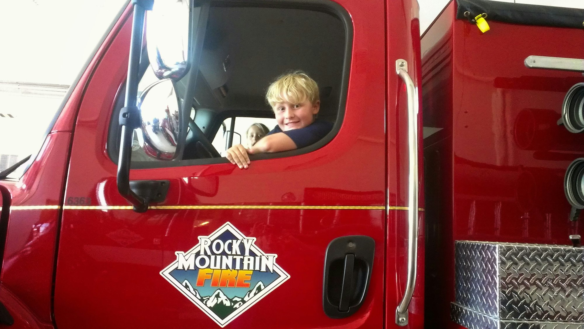 May contain: person, human, truck, transportation, vehicle, and fire truck