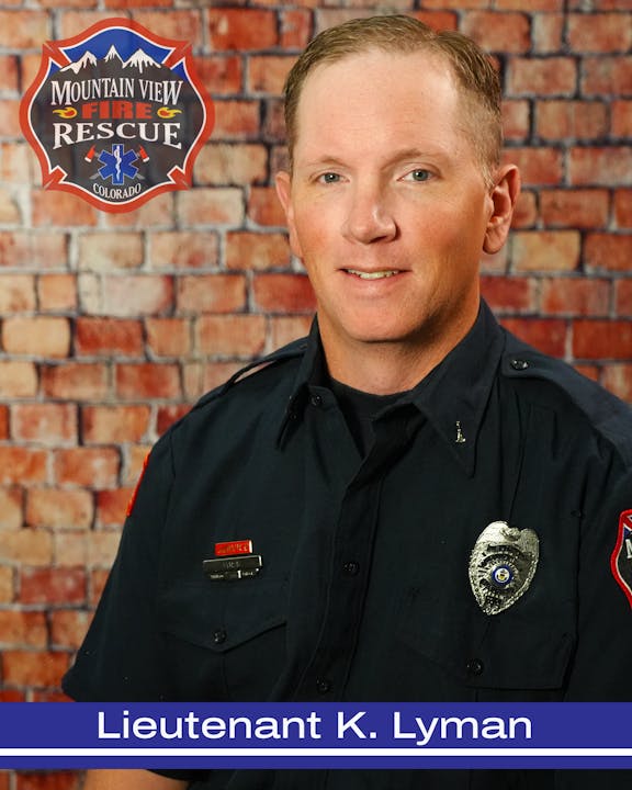 The image features Lieutenant K. Lyman from Mountain View Fire Rescue, with a brick background and a fire department logo.
