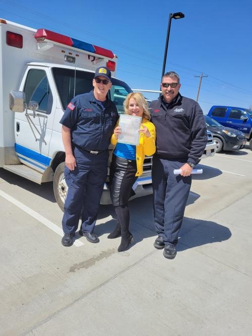 May contain: person, human, shoe, clothing, footwear, apparel, truck, vehicle, transportation, ambulance, and van