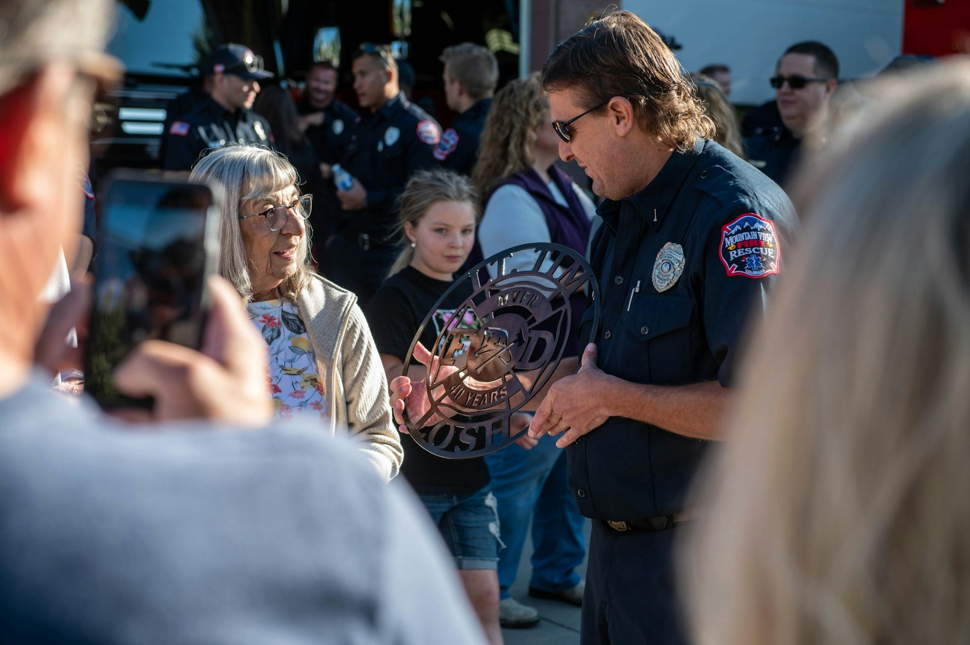 May contain: person, human, sunglasses, accessories, accessory, crowd, officer, military, and military uniform