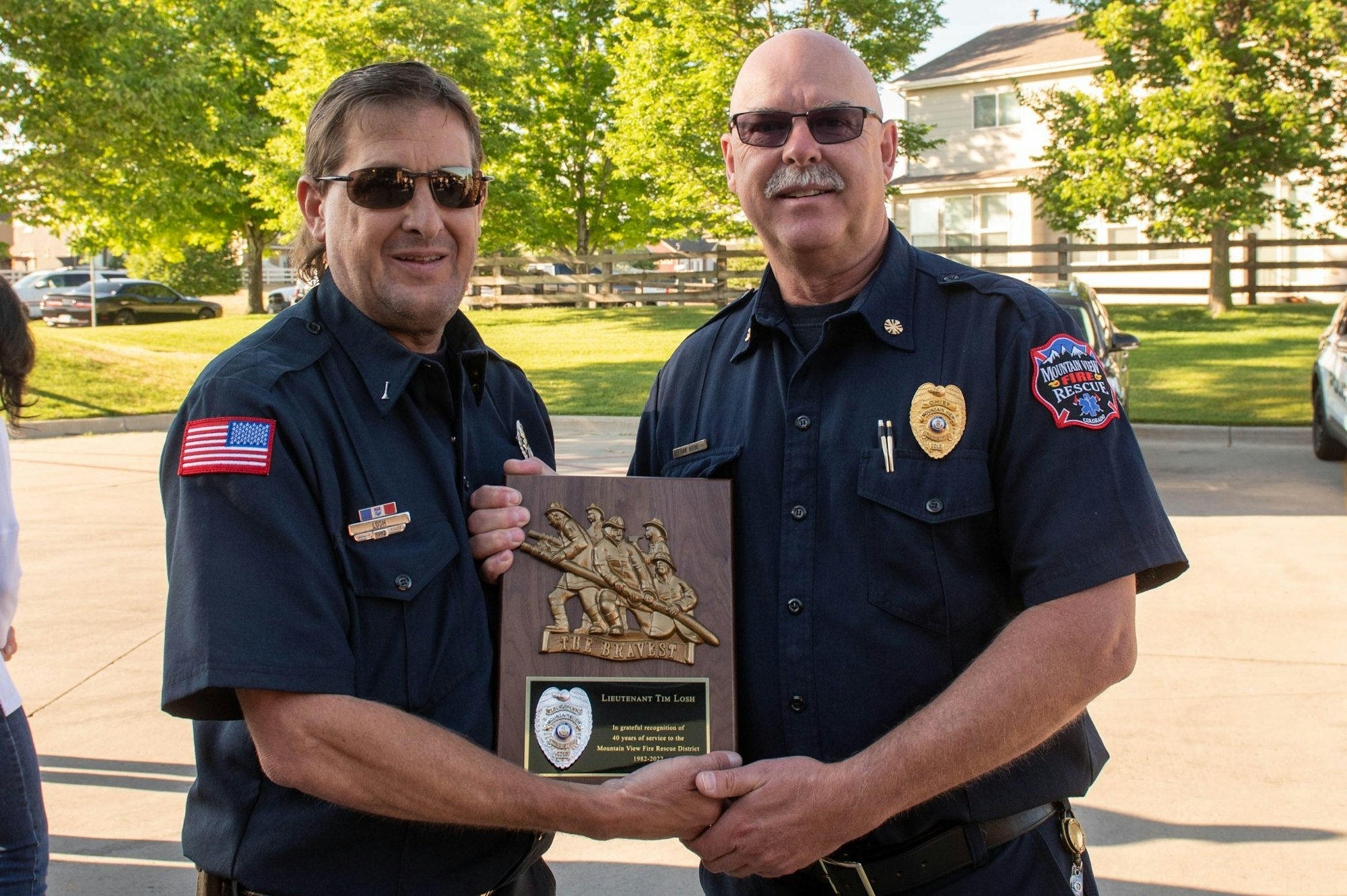 May contain: person, human, sunglasses, accessories, accessory, officer, military uniform, military, car, transportation, vehicle, and automobile