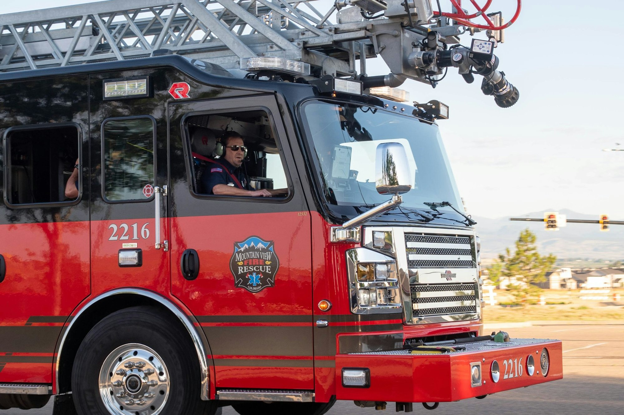 May contain: person, human, truck, vehicle, transportation, and fire truck