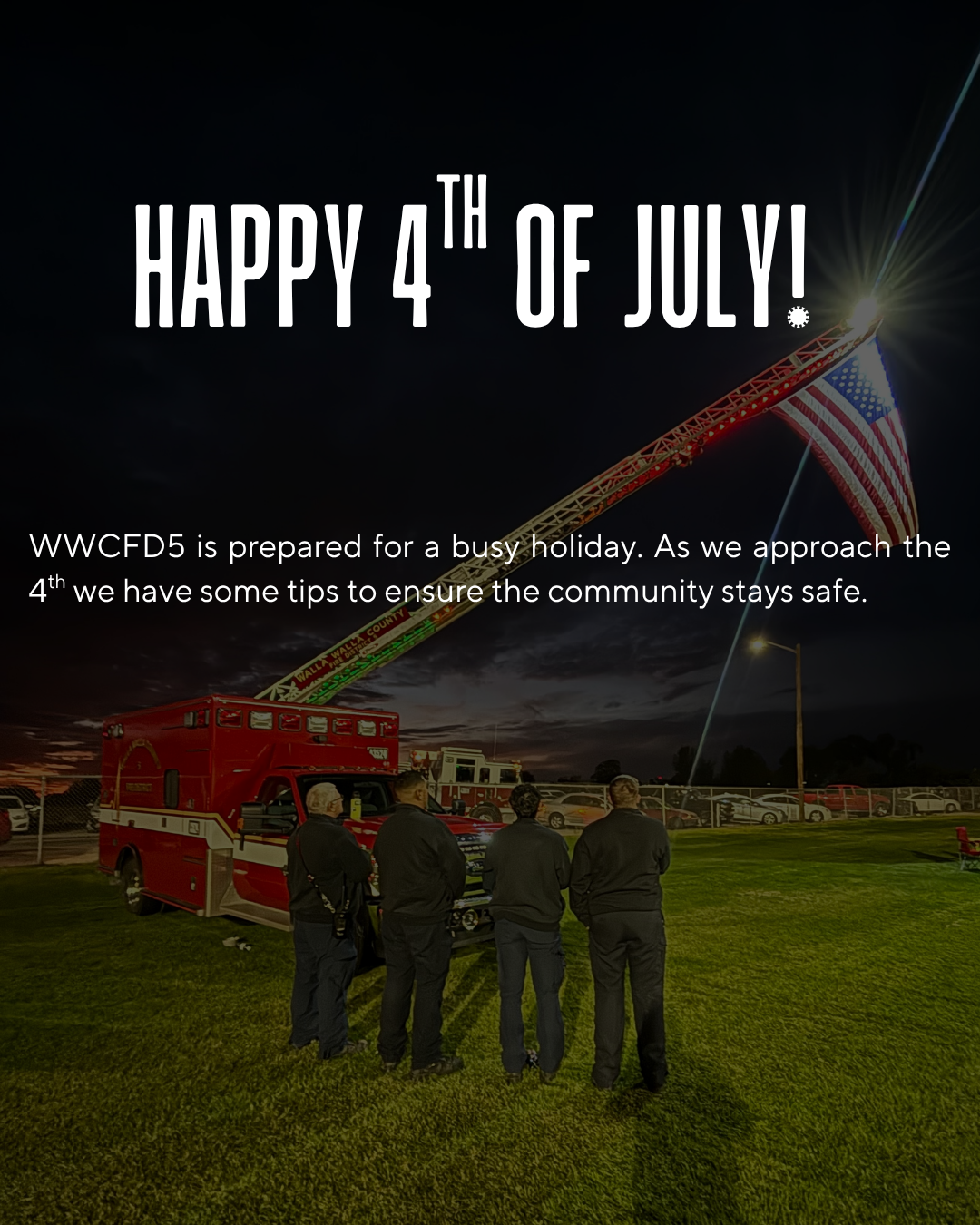 Firefighters by a truck with an elevated flag, captioned "Happy 4th of July!" with safety tips message from WWCFD5.