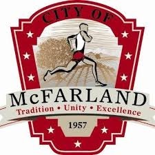 City of McFarland emblem featuring a runner, with "Tradition • Unity • Excellence" and "1957" below.