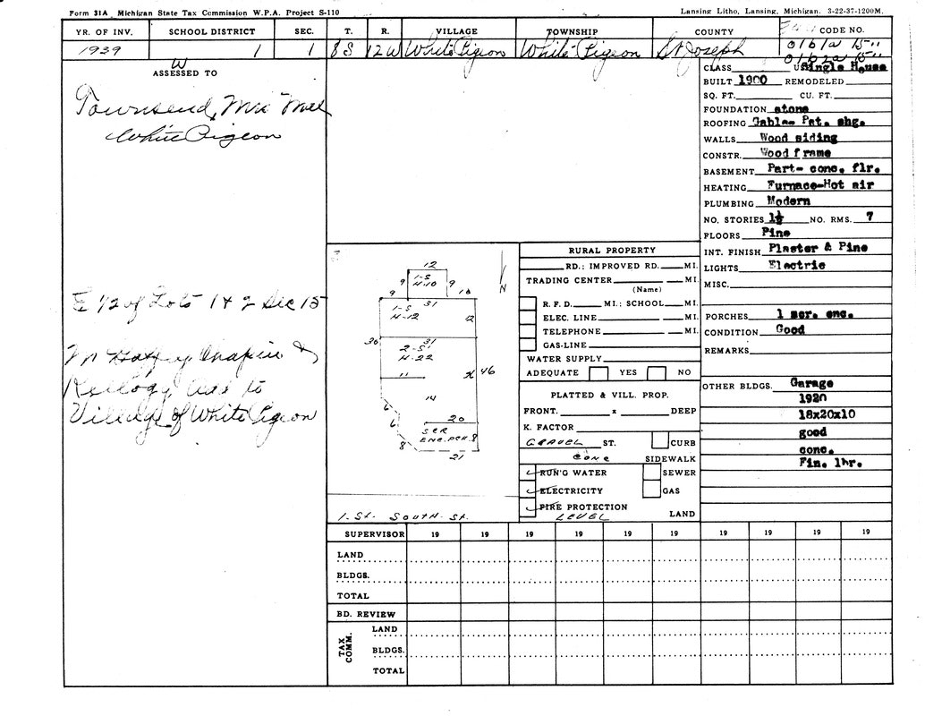A detailed property tax form from 1939 for White Pigeon, Michigan. Includes building specs, utilities, and land assessment.