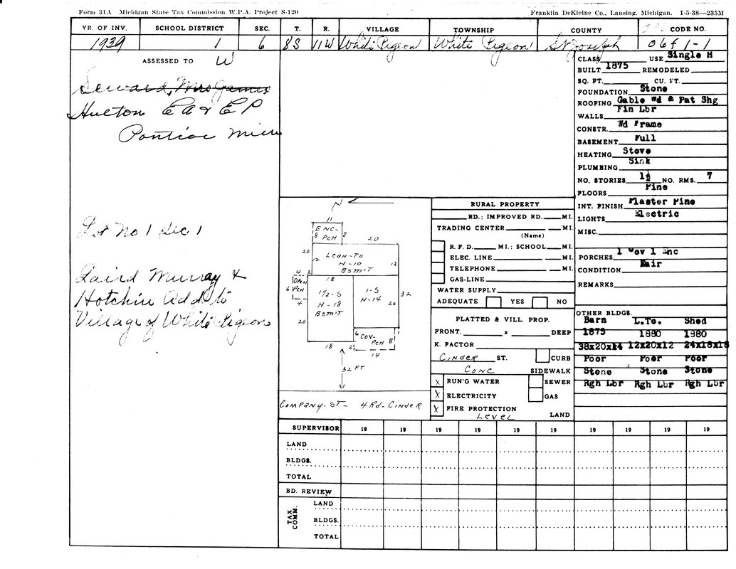 A 1939 property assessment form for a building in White Pigeon, Michigan, detailing construction, utilities, and layout.