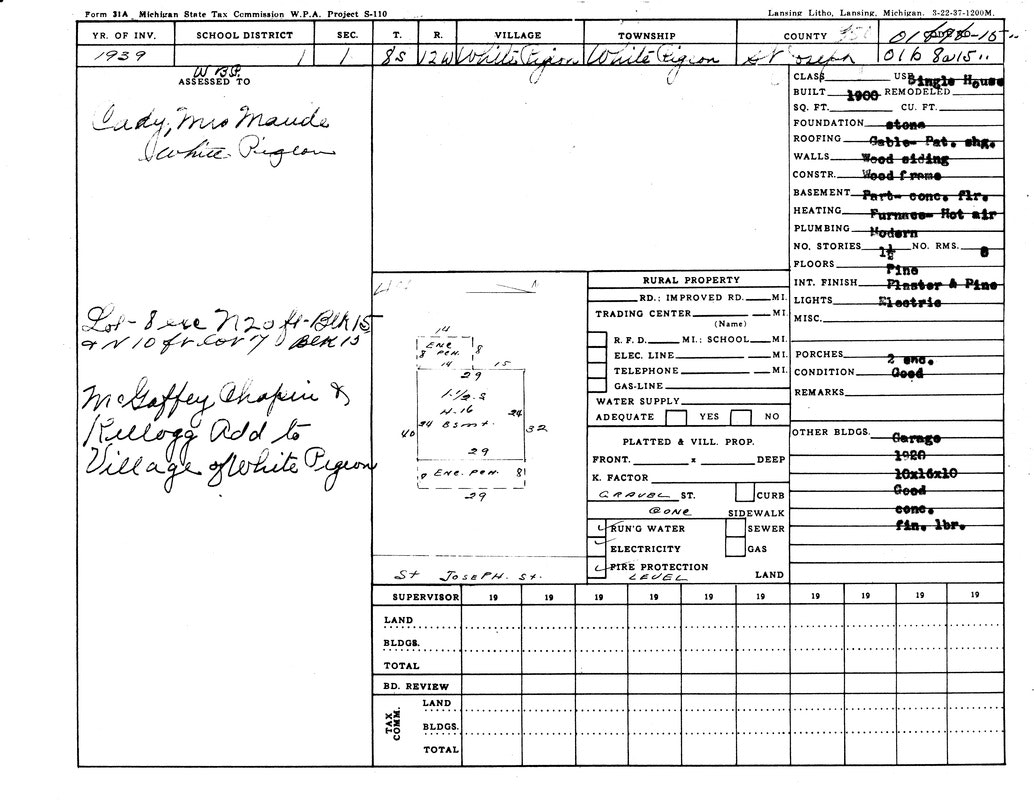 It's a 1939 Michigan State Tax Commission form for property in White Pigeon. Includes owner name, property details, and building info.