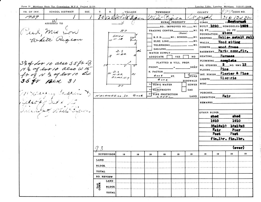 1939 property assessment form for a structure in White Pigeon, Michigan. Includes details on buildings, conditions, and utilities.