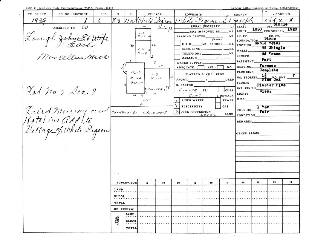 A 1939 Michigan property tax form showing property details, building specs, utilities, and ownership information for White Pigeon village.