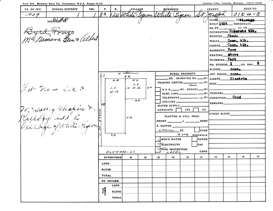 A 1939 Michigan tax form for property in White Pigeon, with details on structure, materials, and utilities.
