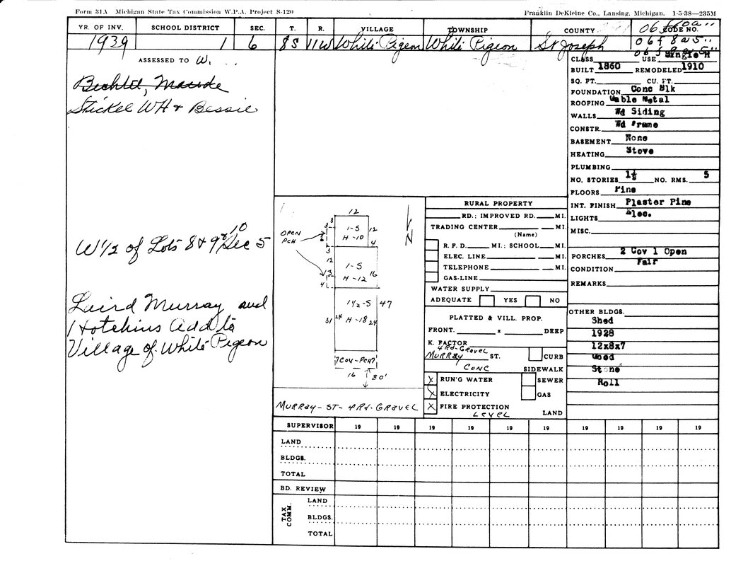 Property record card from 1939 for a building in White Pigeon, Michigan, including dimensions, features, and ownership details.