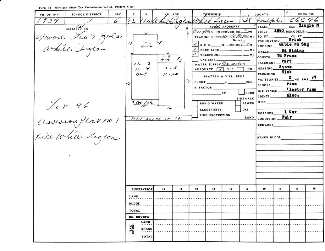 A tax commission form detailing property information in White Pigeon, St. Joseph, from 1939. Includes lot details and construction features.