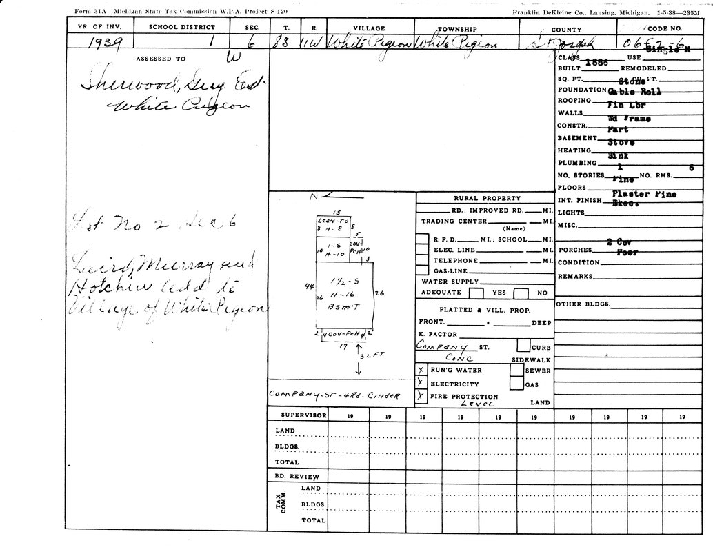 A 1939 Michigan property tax form for White Pigeon, detailing building specs, ownership, and land assessment.