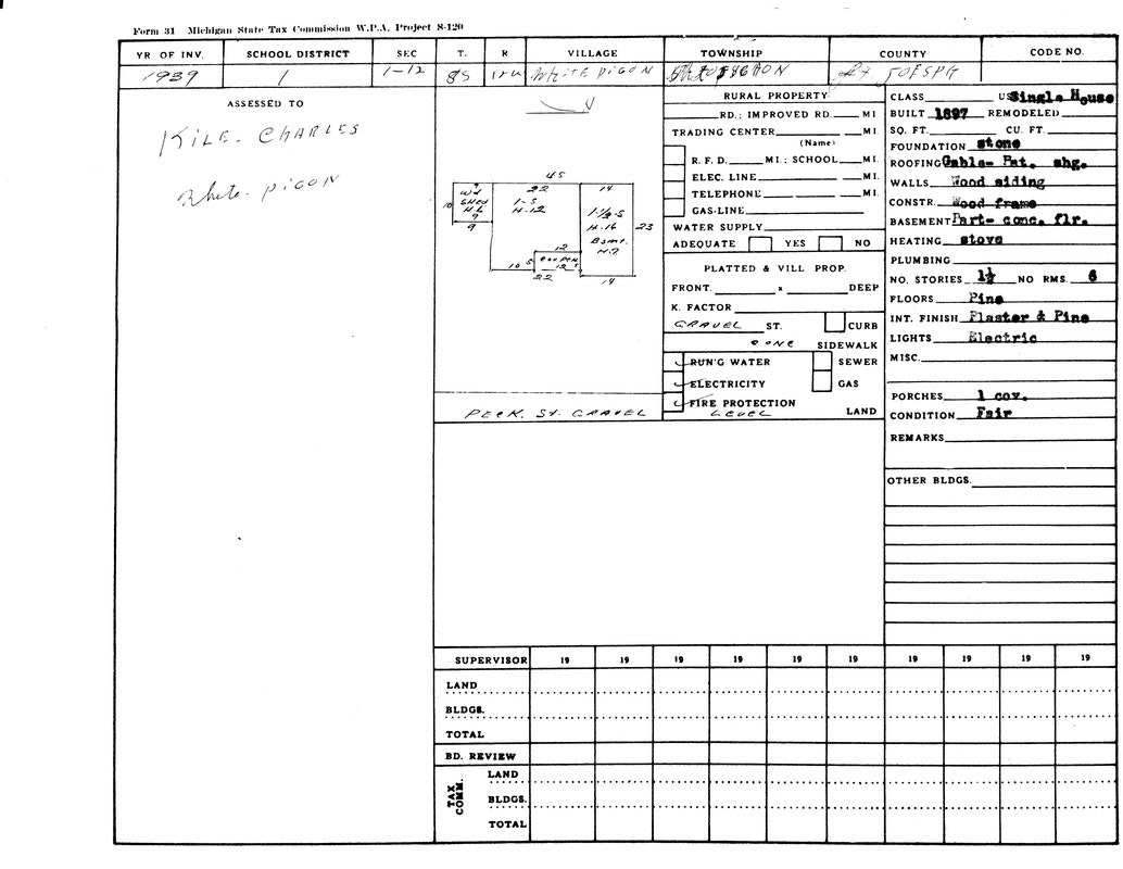 A 1939 Michigan property tax form for Charles Kile, detailing a house in Jefferson, built in 1897 with wood frame construction.