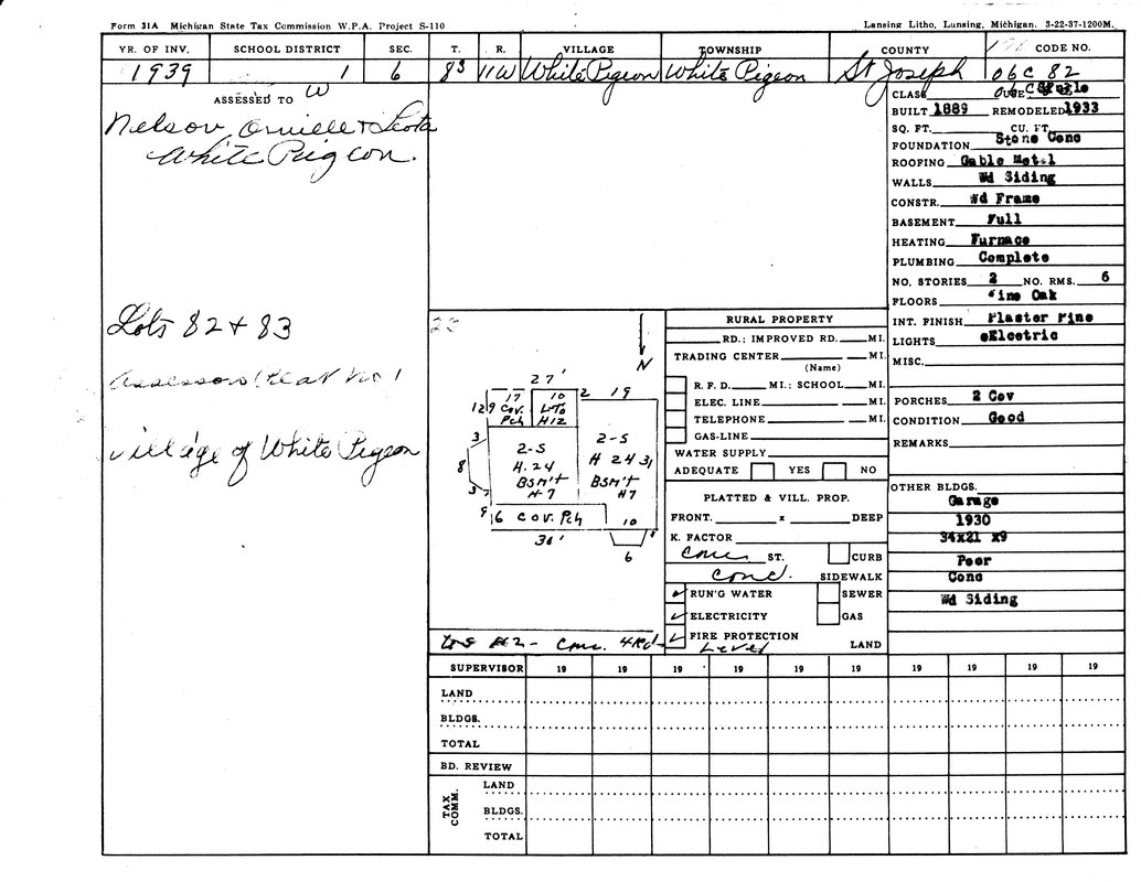 A 1939 Michigan State Tax Commission form detailing property assessment in White Pigeon, St. Joseph County, with structural info.
