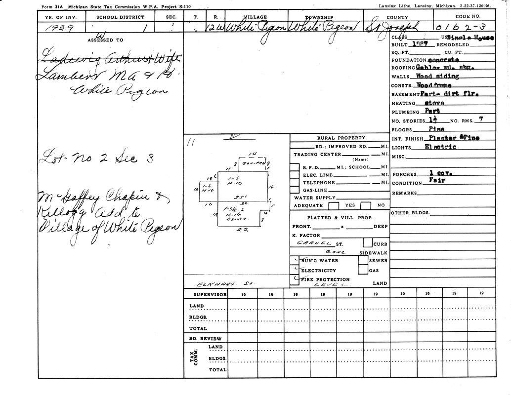 1939 property tax form from Michigan with details on a building in White Pigeon, including materials, utilities, and size.