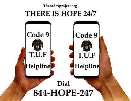 Two hands holding smartphones displaying an ad for a 24/7 helpline with the slogan "THERE IS HOPE 24/7."