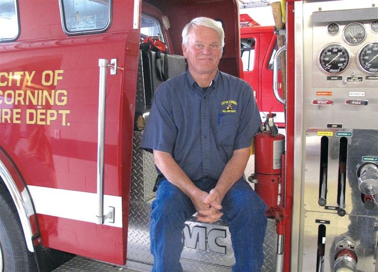 Martin Spannaus sitting on a Fire Engine