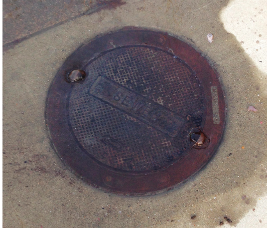 May contain: drain, sewer, hole, and manhole