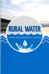 A sign reading "RURAL WATER" with a water droplet graphic against a blue background and natural scene.