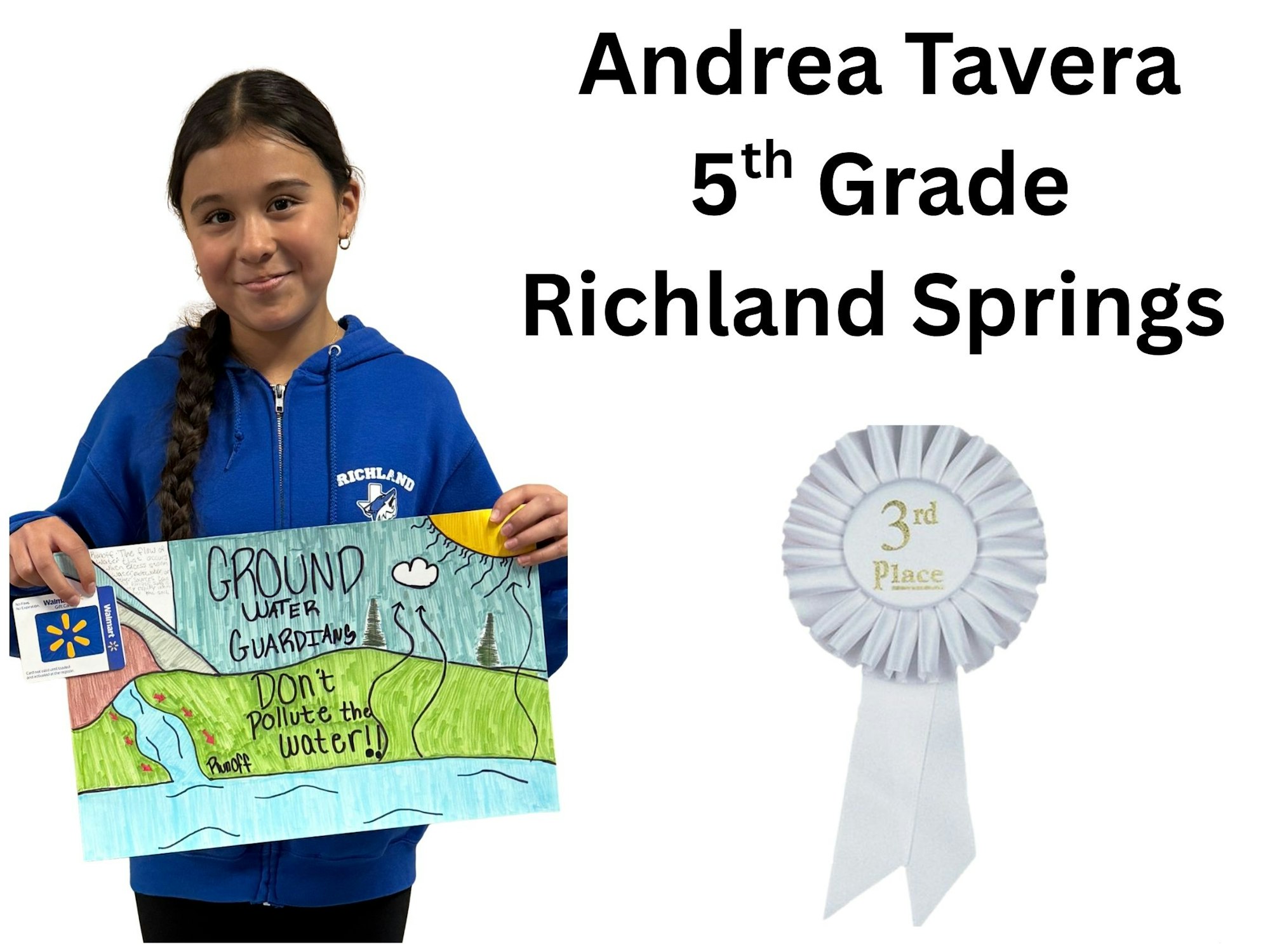 A girl named Andrea Tavera from Richland Springs holds a poster about protecting groundwater, winning 3rd place.