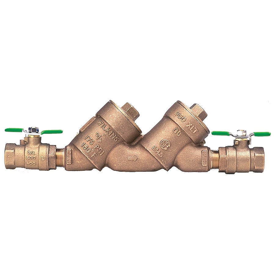 A brass double check valve assembly with green-handled shut-off valves, used for preventing backflow in plumbing systems.
