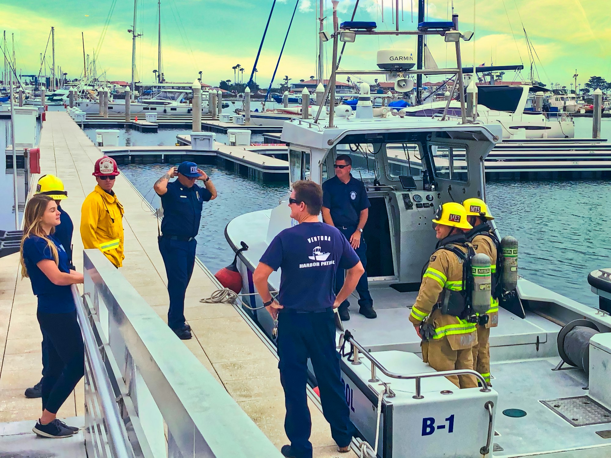 Harbor Patrol Talking WIth Firefighters on the dock