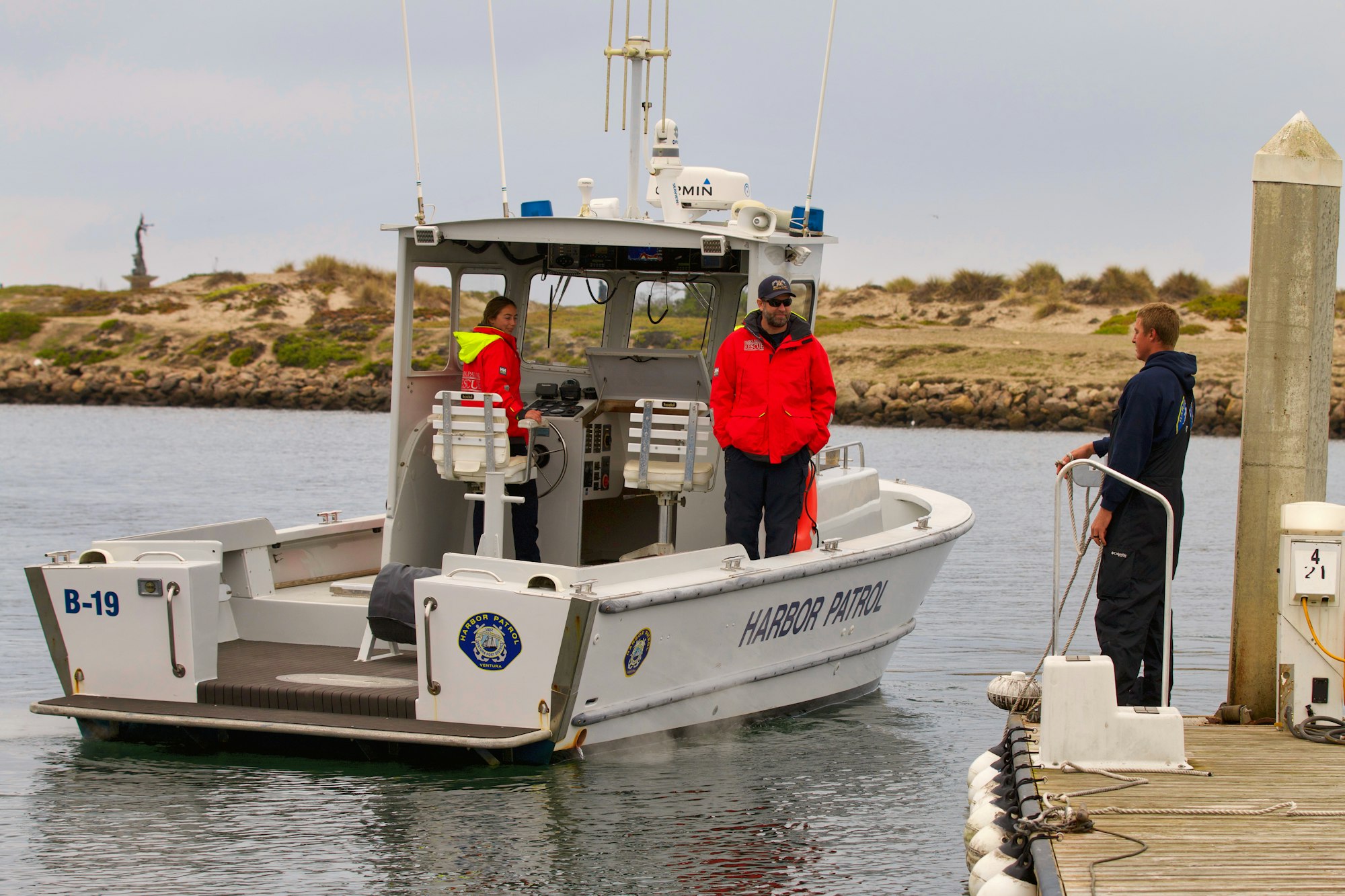 Harbor Patrol Officer Taylor Plasch docking Harbor Patrol Boat