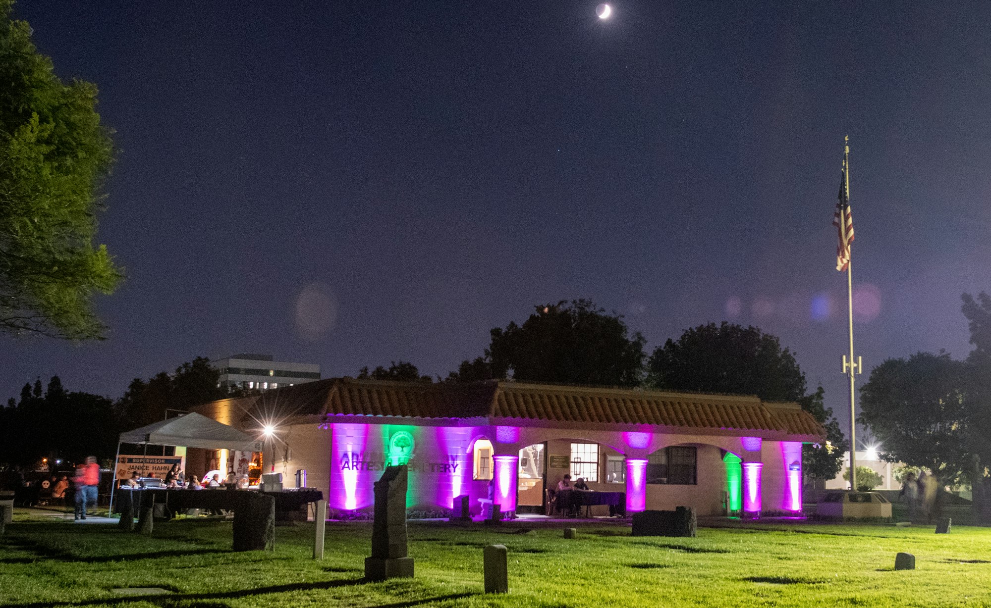 May contain: grass, plant, shelter, outdoors, building, architecture, lawn, night, nature, lighting, and person