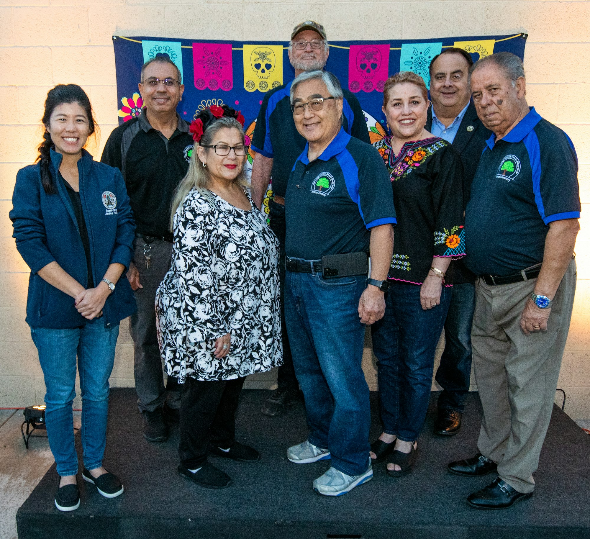 May contain: pants, clothing, jeans, people, person, groupshot, portrait, photography, face, head, man, adult, male, shoe, footwear, coat, jacket, woman, female, glasses, accessories, wristwatch, blazer, hat, and blouse