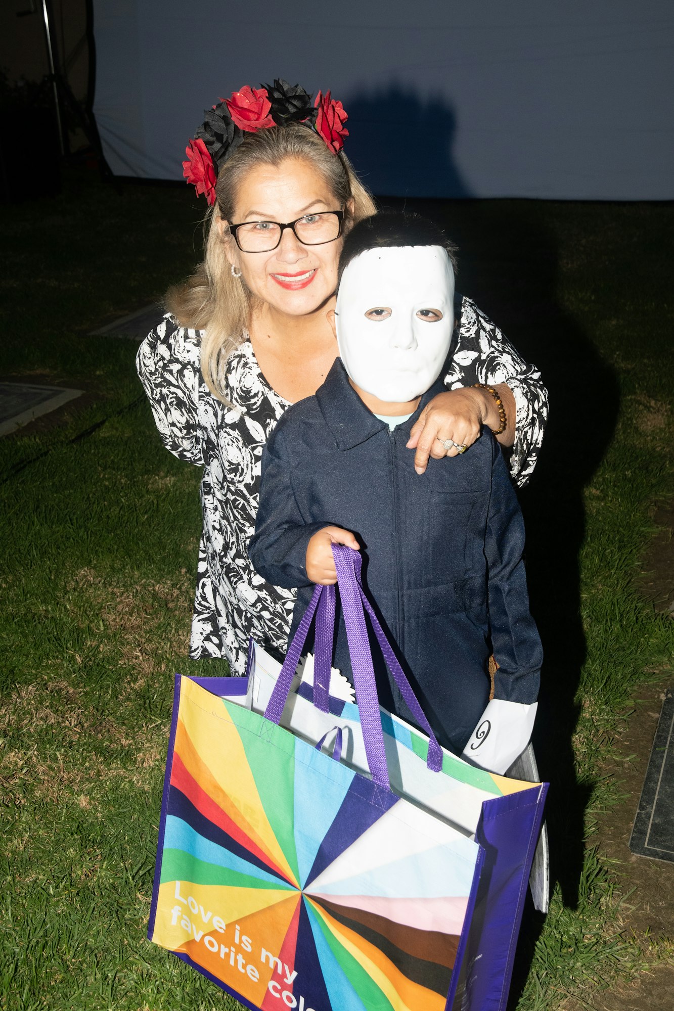 May contain: bag, handbag, accessories, portrait, person, face, photography, head, glove, clothing, woman, adult, female, and glasses