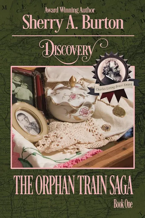 The image features the book "Discovery: The Orphan Train Saga" by Sherry A. Burton, showcasing historical elements and awards.