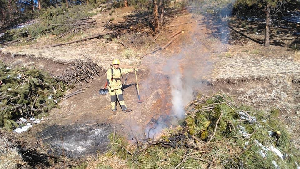 May contain: person and fire