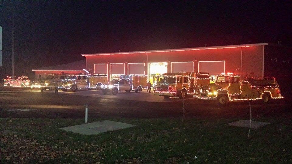 May contain: person, truck, vehicle, transportation, fire truck, and fire station