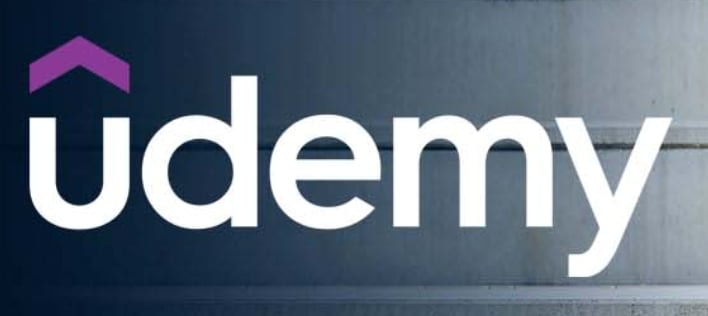 The image shows the Udemy logo with a purple accent over the "u" on a gradient background.