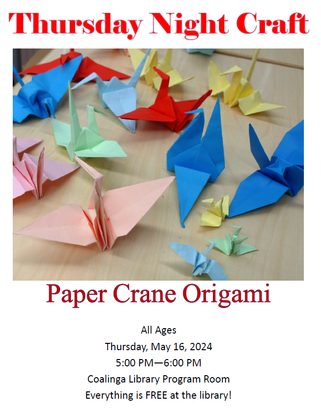 Colorful paper crane origami displayed for a library craft event.