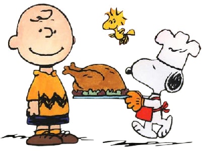 A dog in a chef hat offers a turkey to a smiling boy, with a small bird flying nearby.