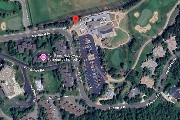 The image shows a map view featuring a golf course, streets, and a location marked "Grill On The Gore."