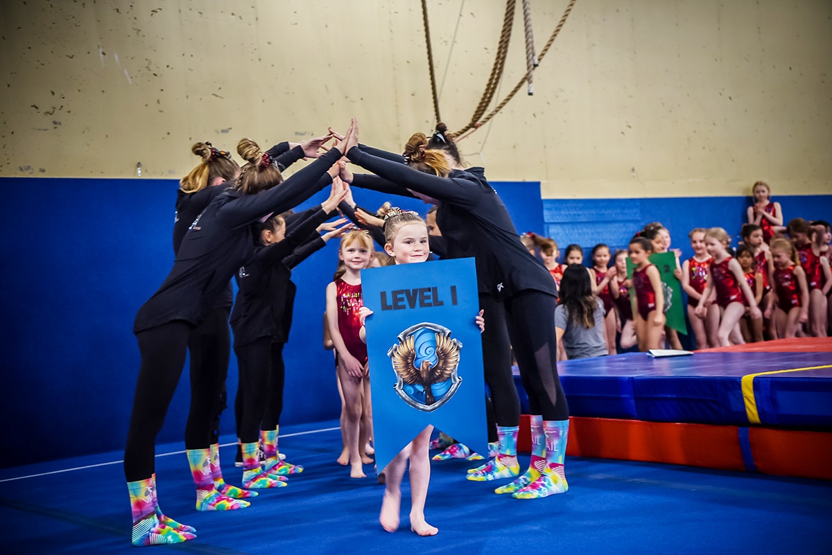 Young gymnasts entering the Vail Gymnastics Spring Show