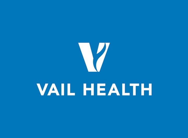 A blue logo with "VAIL HEALTH" written in white font.