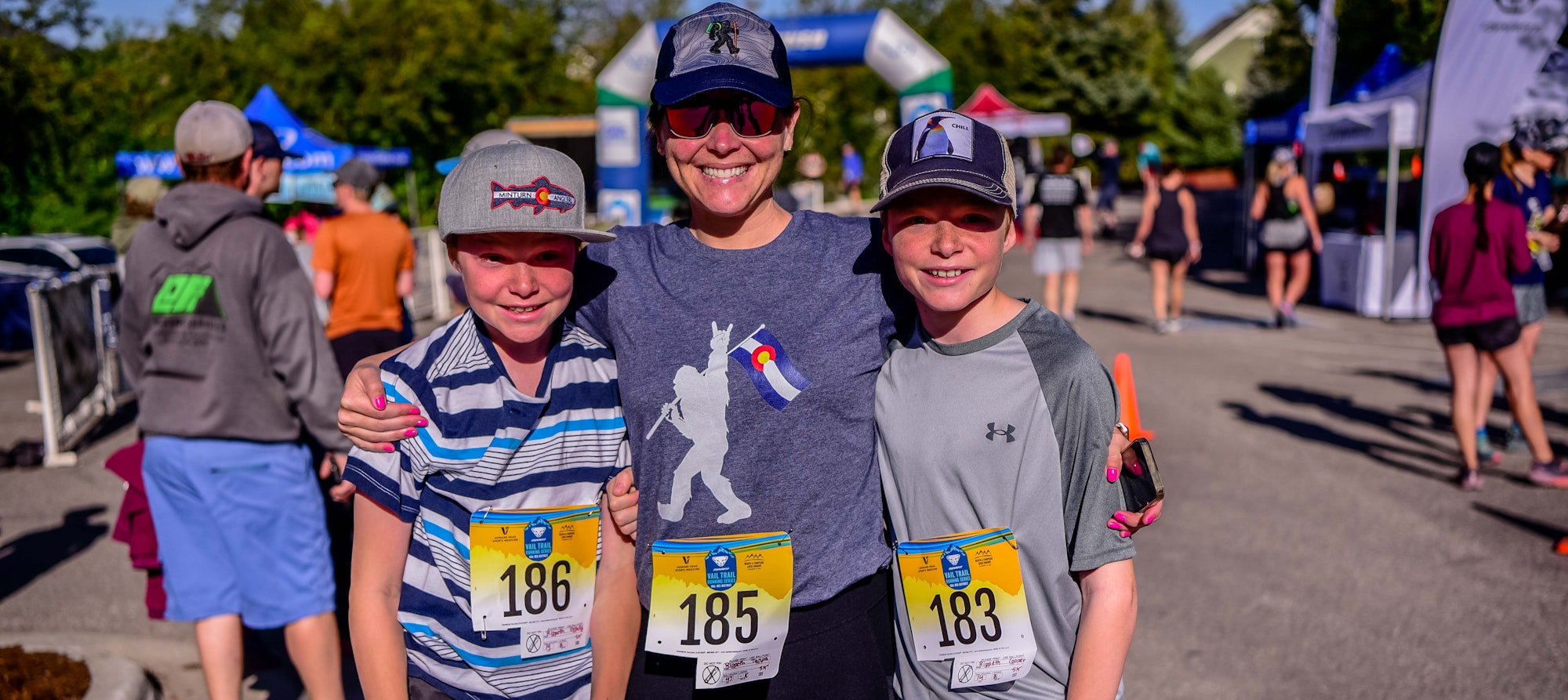 May contain: clothing, t-shirt, shorts, cap, hat, baseball cap, accessories, sunglasses, footwear, shoe, adult, male, man, person, marathon, running, sport, helmet, face, head, photography, and portrait